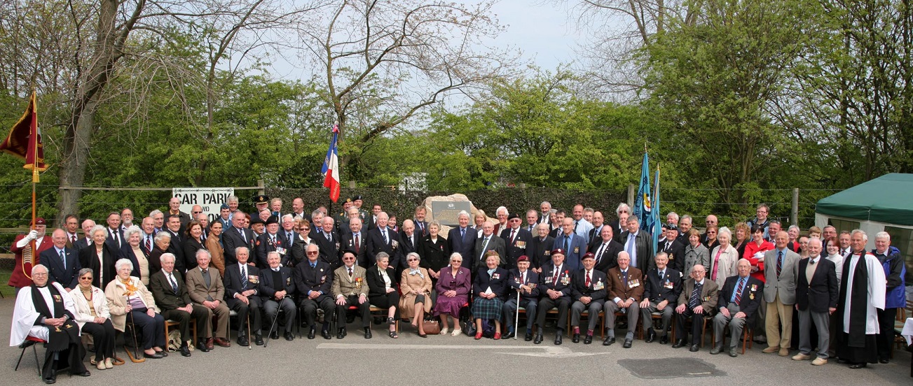 ELMS members gathered at the Memorial to the Helpers