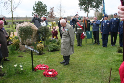Major David Sharpe laying a wreath at the memorial