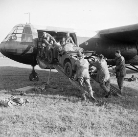 Soldiers loading a jeep into a Horsa glider