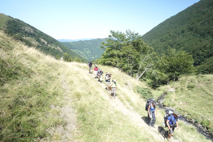 Walkers following the Chemin de la Liberte mountain path