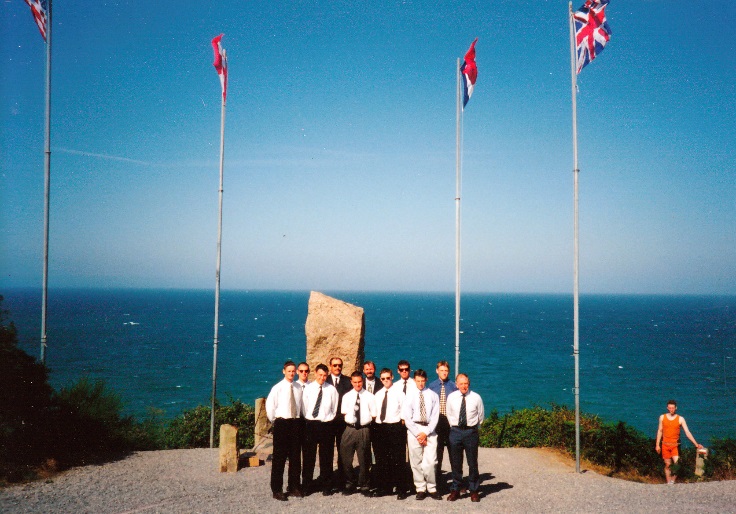 Group gathered at the Shelburn memorial above the Brittany coast